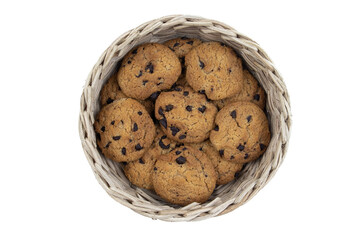 Chocolate chip cookies in a bamboo basket isolated on white background