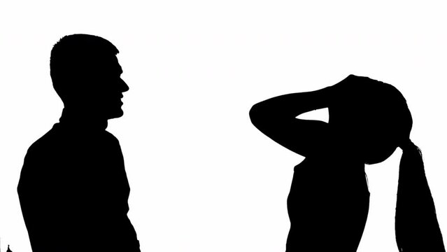 Silhouette of arguing man and woman. black and white mask