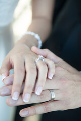 bride and groom holding hands