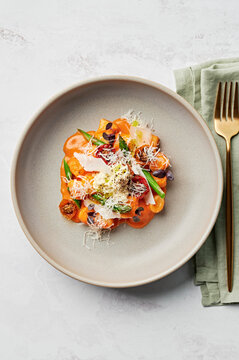Gnocchi, tomato emulsion, roasted cherry tomatoes, asparagus spears, stracciatella, parmesan, purple basil