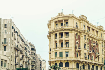 Historic houses in European colonial style in Talaat Harb Square near Tahrir Square, downtown, in Cairo, Egypt - obrazy, fototapety, plakaty