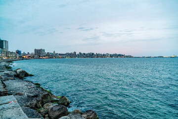 Skyline and coastline of Alexandria by sunset with the Mediterranean sea, Egypt