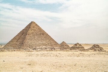 View of Gize Pyramids with desert surrounding in Giza, Egypt