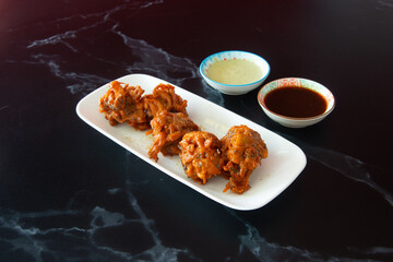 Indian food in display for the photo shoot in Tokyo, Japan. Nowadays in 2023, people rely on the food delivery service