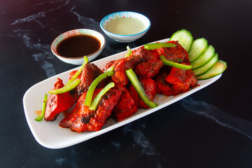 Indian food in display for the photo shoot in Tokyo, Japan. Nowadays in 2023, people rely on the food delivery service