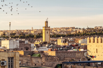 Obraz premium View of sklyline of Medina with Minarets in Medina by sunset, Morocco, Fez