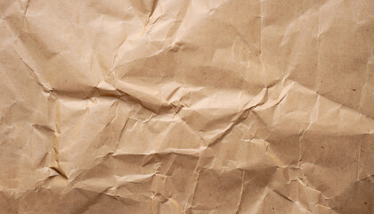 Obraz premium A sheet of brown paper is wrinkled.