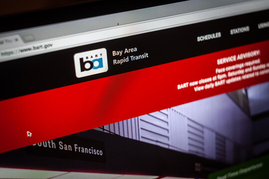 SAN FRANCISCO, CALIFORNIA - APRIL 11, 2021: Selective blur on BART logo on a screen of its website indicating schedules. BART bay Area Rapid transit is public transportation authority of San Francisco