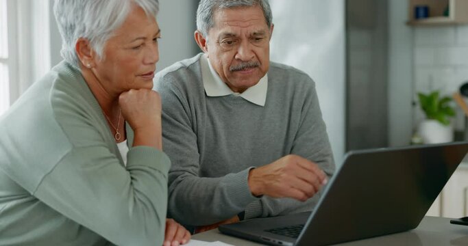 Discussion, computer and senior couple in kitchen paying bills, debt mortgage online together. Love, conversation and elderly man and woman in retirement networking on internet with laptop at home.