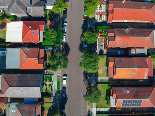 Drown view looking down on sydney residential houses in Sydney suburbia suburban house roof tops and streets  NSW Australia  © Elias Bitar