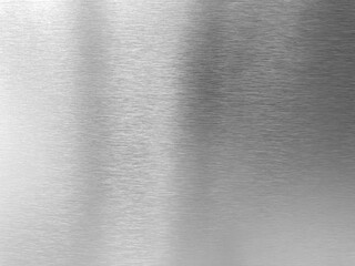 Shiny silver brushed stainless steel plate background. Abstract metal texture background or...