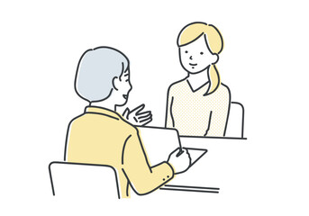 担当者の説明を聞く若い女性