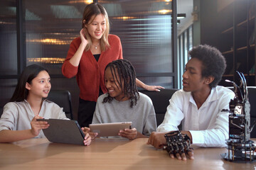 Group of international or multi ethnicity student having a discussion together about science project in class room.