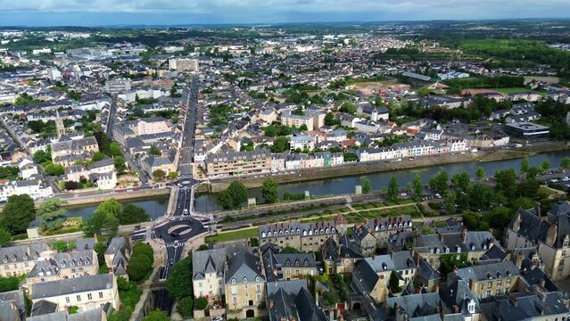 Le Mans cityscape with bridge and Sarthe river in France. Aerial drone view