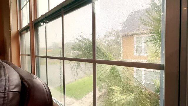 Looking through window during tropical storm