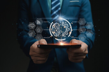 Businessman holding the mobile phone in the age of AI. AI Artificial Intelligence concept. Icon, symbolic, machine learning, artificial intelligence of futuristic technology.