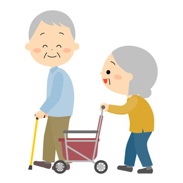 会話しながら歩いている老夫婦