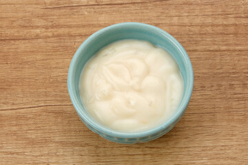 Fresh Healthy Plain Yogurt in a small bowl
