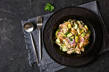 tuna salad with avocado, onion, cucumber, capers