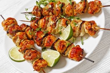 chicken souvlaki with thyme and lime on plate
