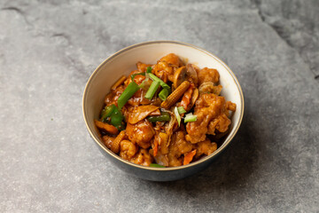 Stir Fried Ginger with fish and baby corn served in dish isolated on background top view of bangladesh food