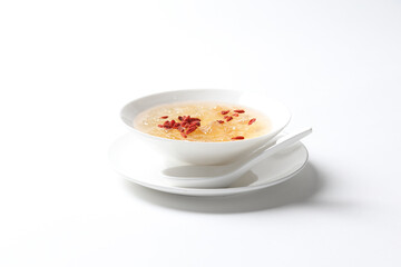 chilled double boiled fresh bird nest with hashima and wolf berries asian sweet soya milk soup in white bowl healthy dessert halal vegan food menu for Hong Kong cafe