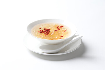 chilled double boiled fresh bird nest with hashima and wolf berries asian sweet soya milk soup in white bowl healthy dessert halal vegan food menu for Hong Kong cafe