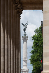 Monument aux Girondins as seen through the entrance of the Grand Théâtre in Bordeaux, France. Taken in July 2023.