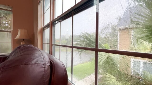 Looking through window during tropical storm