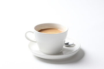 hot drink milk tea , milo , kopi coffee with milk in white cup and tea spoon and small plate in white background beverage halal drink food vegan menu for cafe