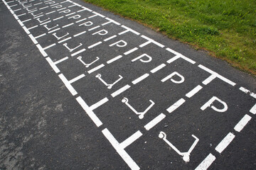 Parking lot sign for scooters
