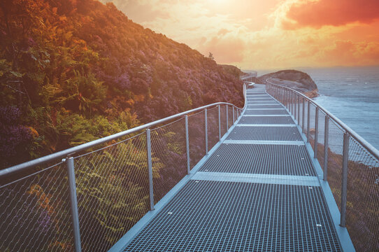Metal walkway on the mount along the sea in autumn. Norway, Europe