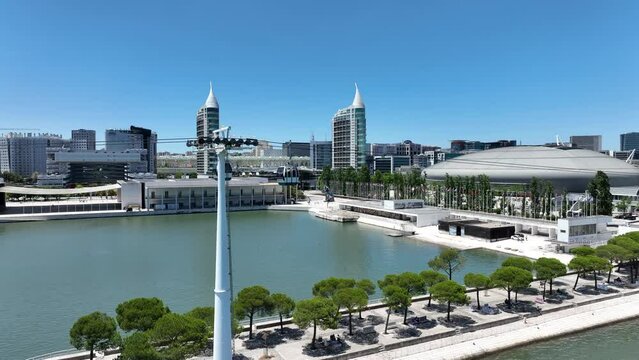 Modern Skyline And Famous Telecabine Of Lisboa At Park Of The Nations In Lisbon, Portugal. aerial