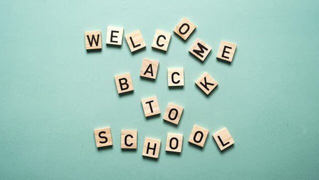 Back to school stock video 4k. Welcome back to school text, stop motion animation