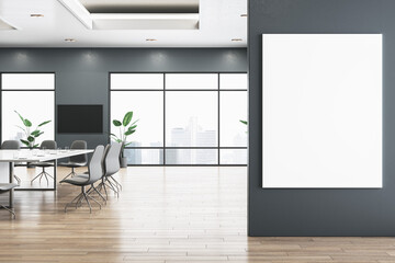Modern spacious meeting room interior with empty white mock up banner on wall, wooden parquet flooring, furniture and panoramic window with city view. 3D Rendering.