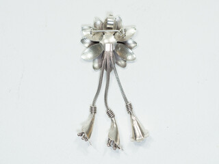 Silver jewelry and gemstone on white background