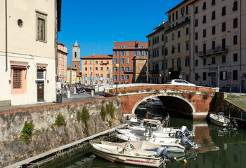 city canal in livorno, tuscany italy