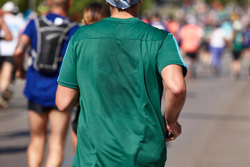 Fototapeta premium Runner on the street. Healthy lifestyle. Jogging exercise. Athletics