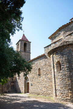 View of the 10th century church of Sant Joan de Fàbregas in Rupit, Catalonia, Spain, July 16, 2023, vertical