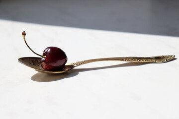 Cherry berry on a teaspoon