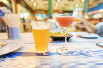 Draft Beer and Cocktail glass on table. Oktoberfest, Party and celebration concept