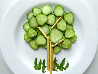 Healthy and fun food for kids, food serving for kids, tree, vegetables, cucumber
