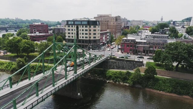Aerial view of Easton PA and Delaware River with bridge leading into the city