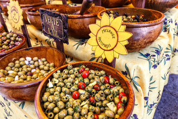 Display of assorted types of olives for sale