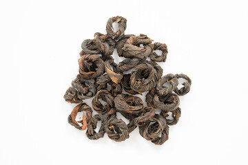 Ceylon Handspun Black Tea on white background. Ceylon Handcrafted Tea. Hand Made Jayachakra Tea.