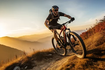 Fotobehang Young man riding bicycle on mountain trail sport © Tony A