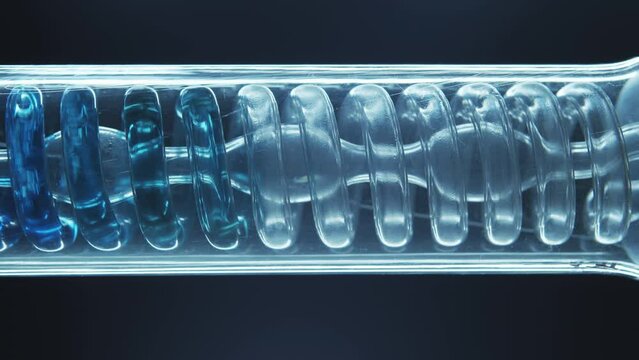 Blue liquid substance flows through a spiral glass flask. Glass test tube. Filtration of liquidity. Production of perfumery and cosmetics. Black background. Aromatherapy. Сlearing process.