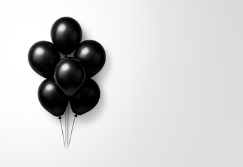 Black balloons isolated on a white background with copy space. Black Friday sale concept for banners, wall art, social media and more.