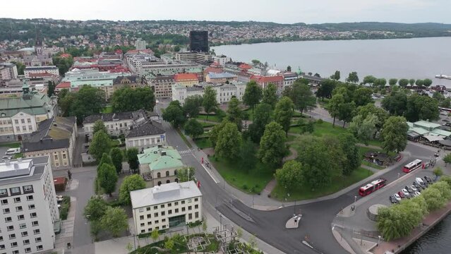 City park and old government office building in Jonkoping city centre, Sweden. Drone flyover