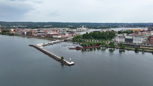 Pirenfyren historic landmark and wharf on lake. Jonkoping, Sweden. Aerial drone cityscape.